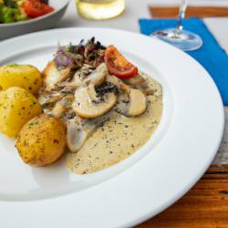 Fish with Artichoke hearts and Mushroom Sauce